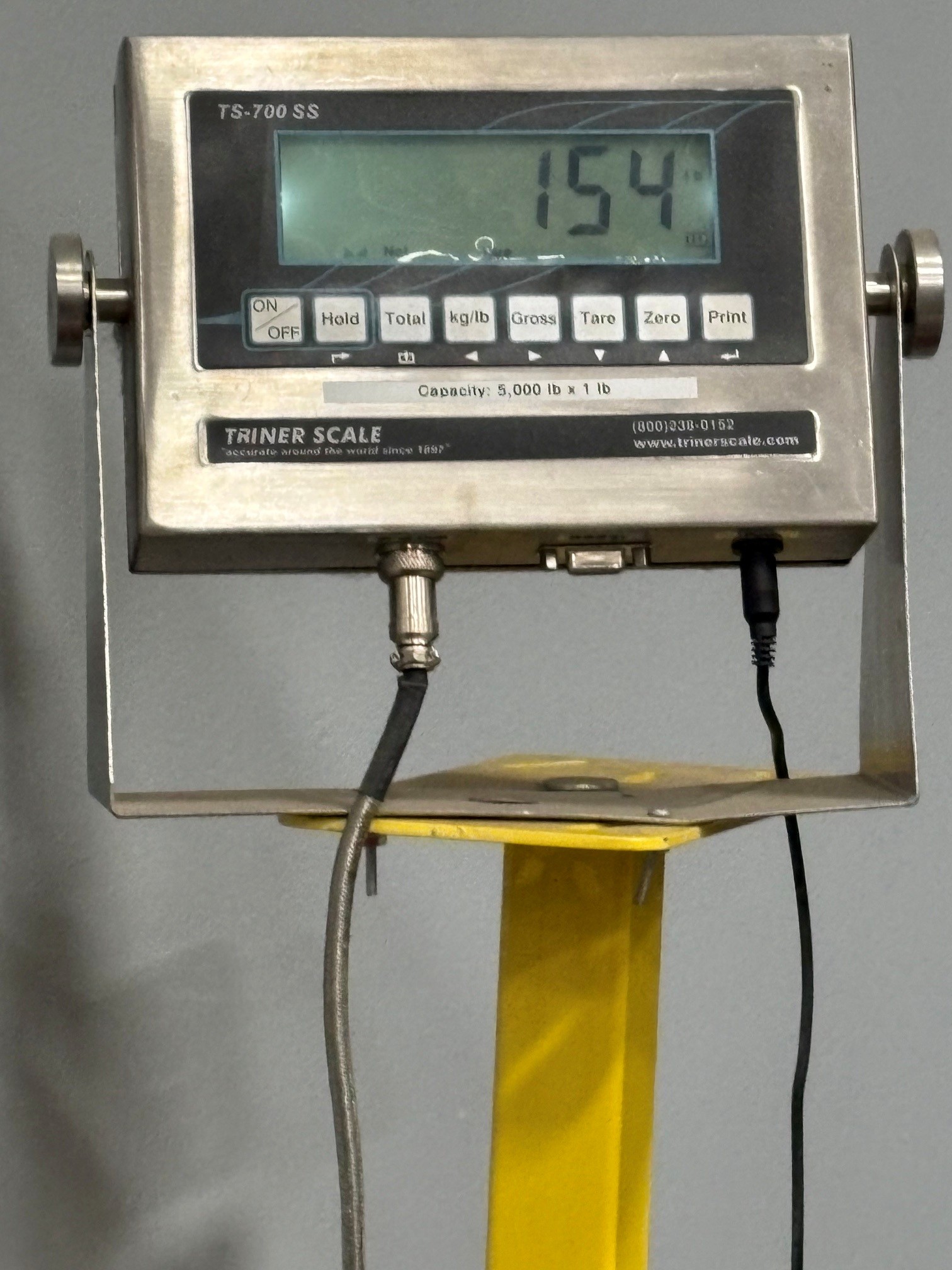 scales showing 154 pounds