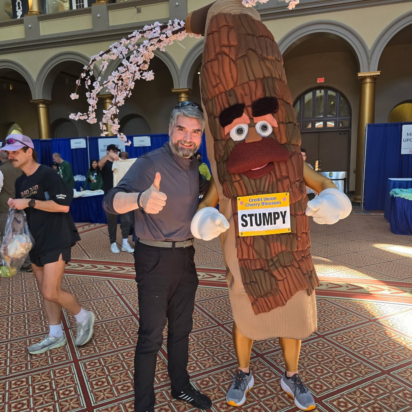 Man with the Cheery Blossom Mascot, Stumpy