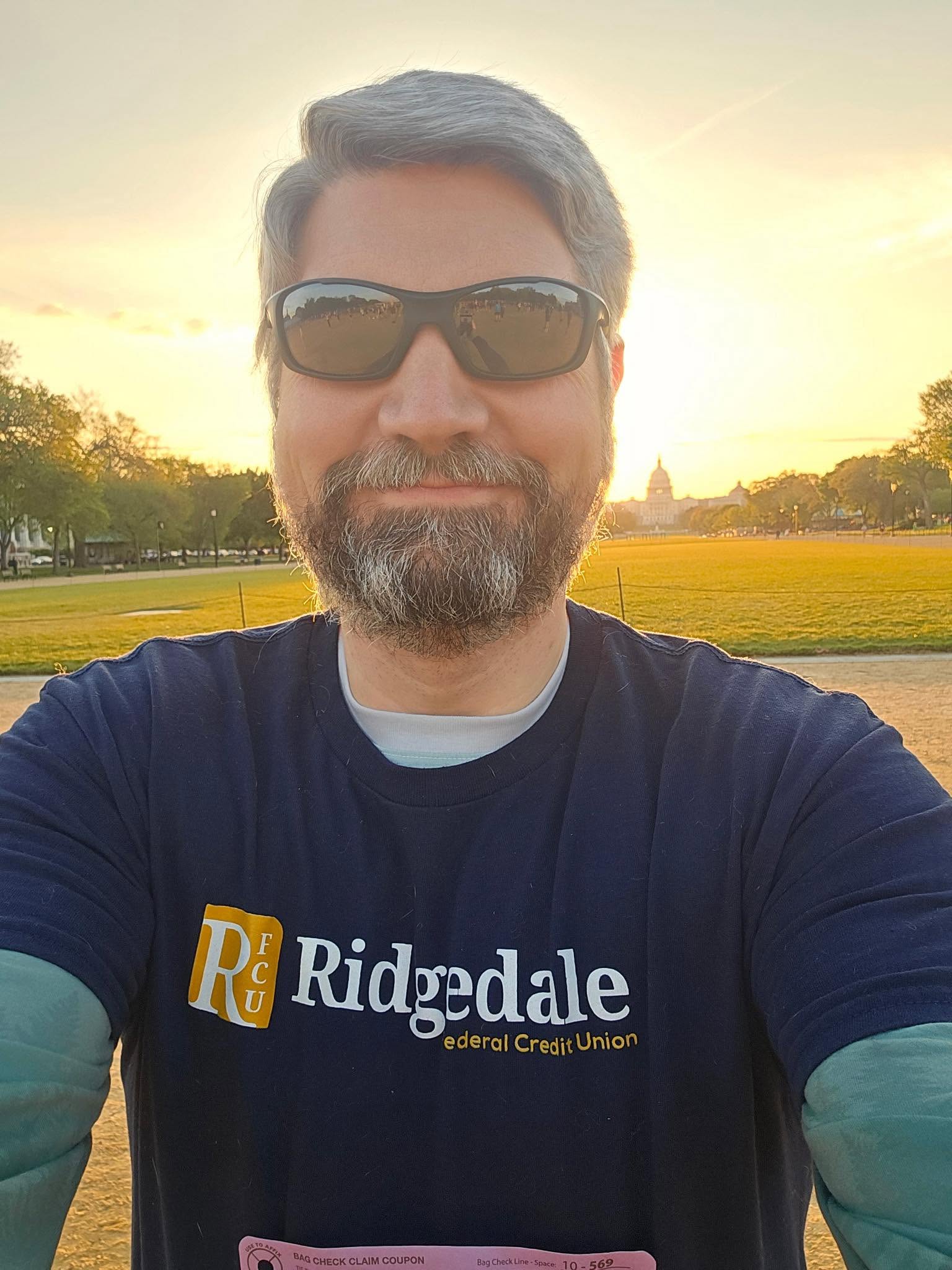 proud runner at the finish line